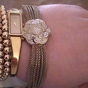 Anne Klien gold tone watch with Swarovski crystals
